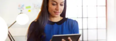 woman looking at a mobile device